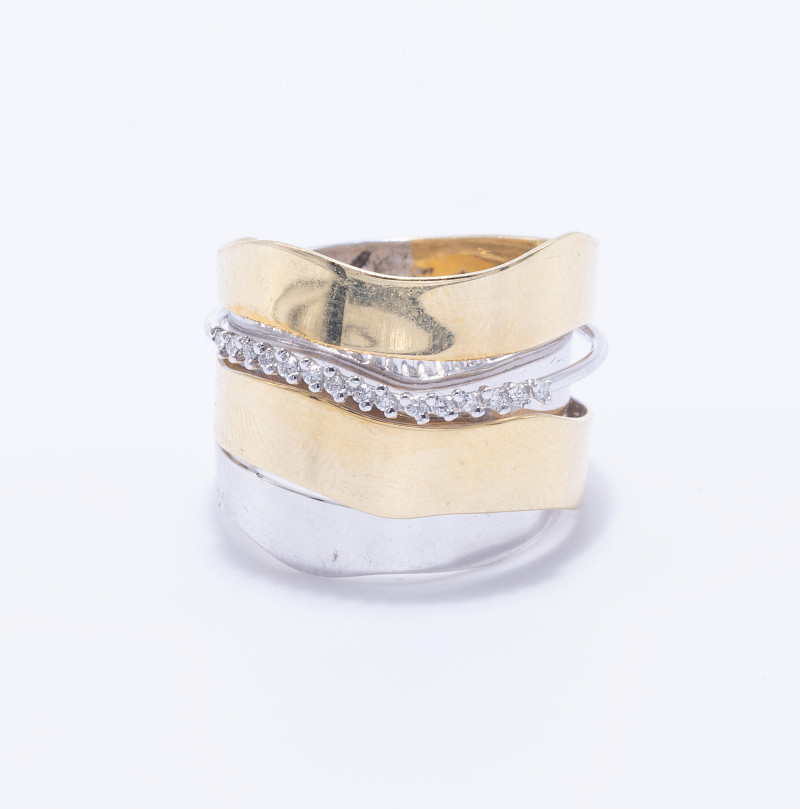 Anillo oro amarillo y blanco 18k brillantes 0.075ct