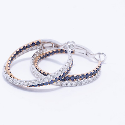 Par de argollas oro blanco y amarillo 18k con 64 zaf 2.46ct y 68 brill 2.06ct